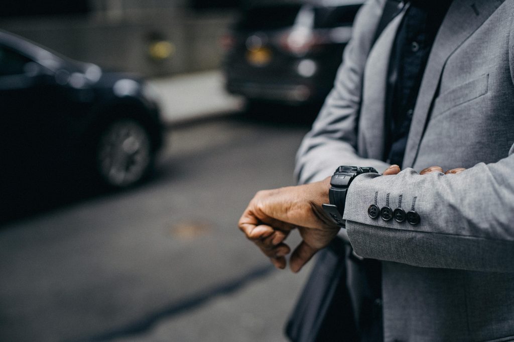 Businessman looking at his watch