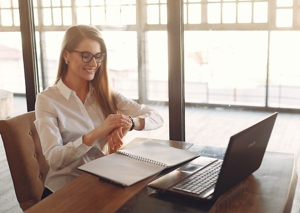 employee checking time at workplace